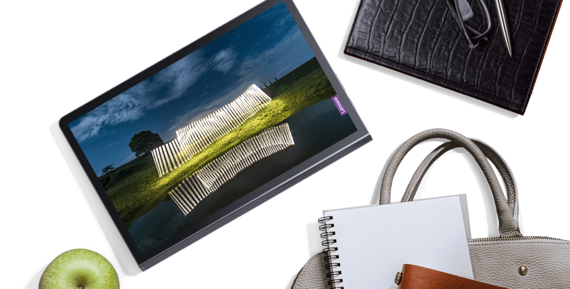 Imagen de la tablet Lenovo Yoga Tab 11 desde arriba, y con la pantalla encendida